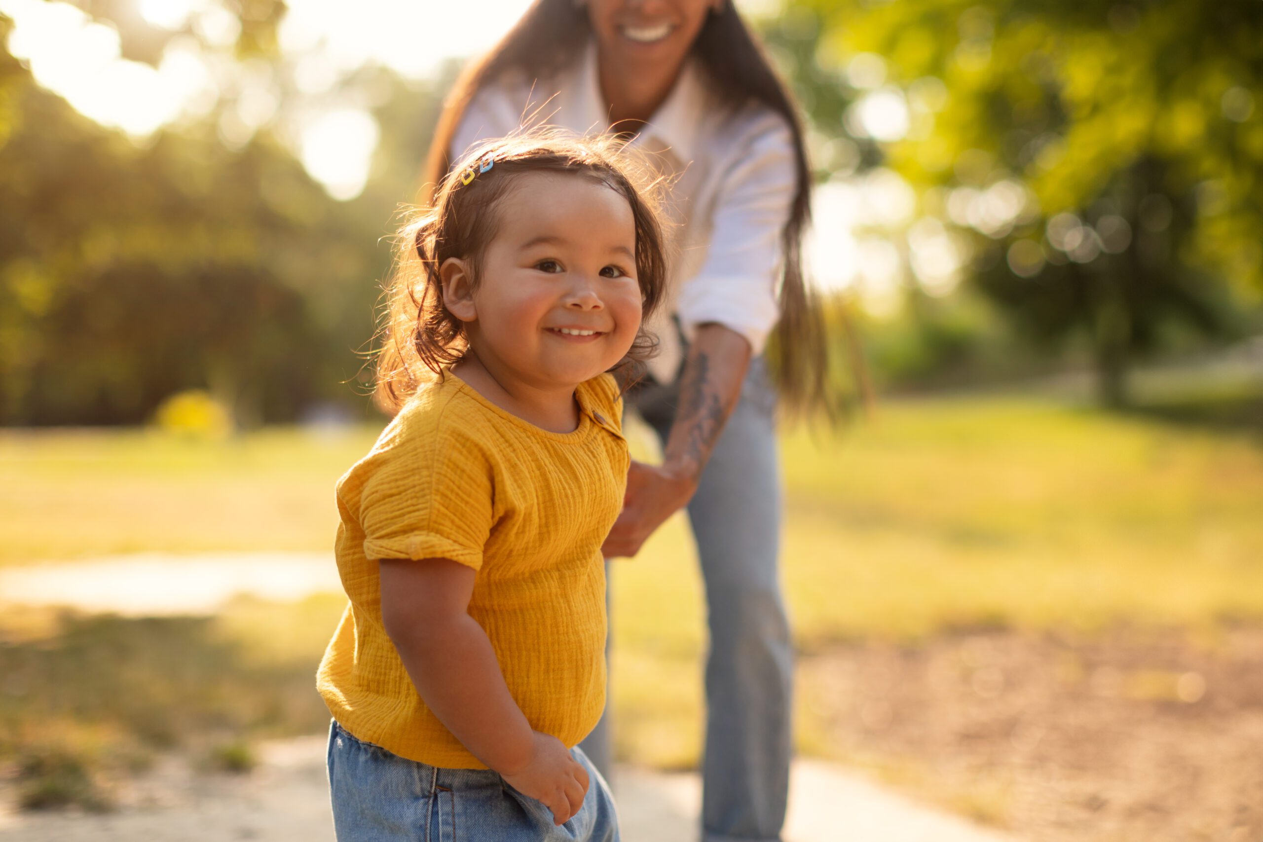 Autistic Girl Holding Mom’s Hand